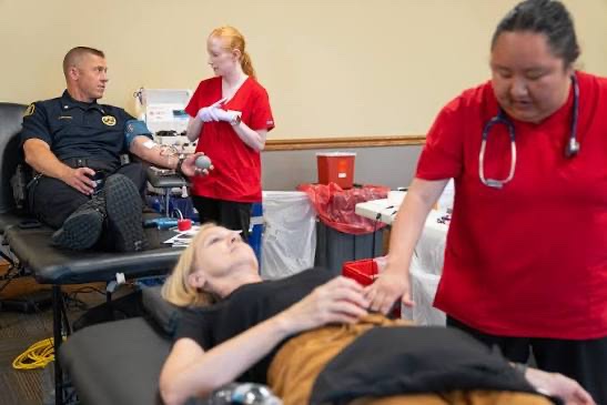 The Skyway Blood Drive in progress: donors on cots, nowhere to go